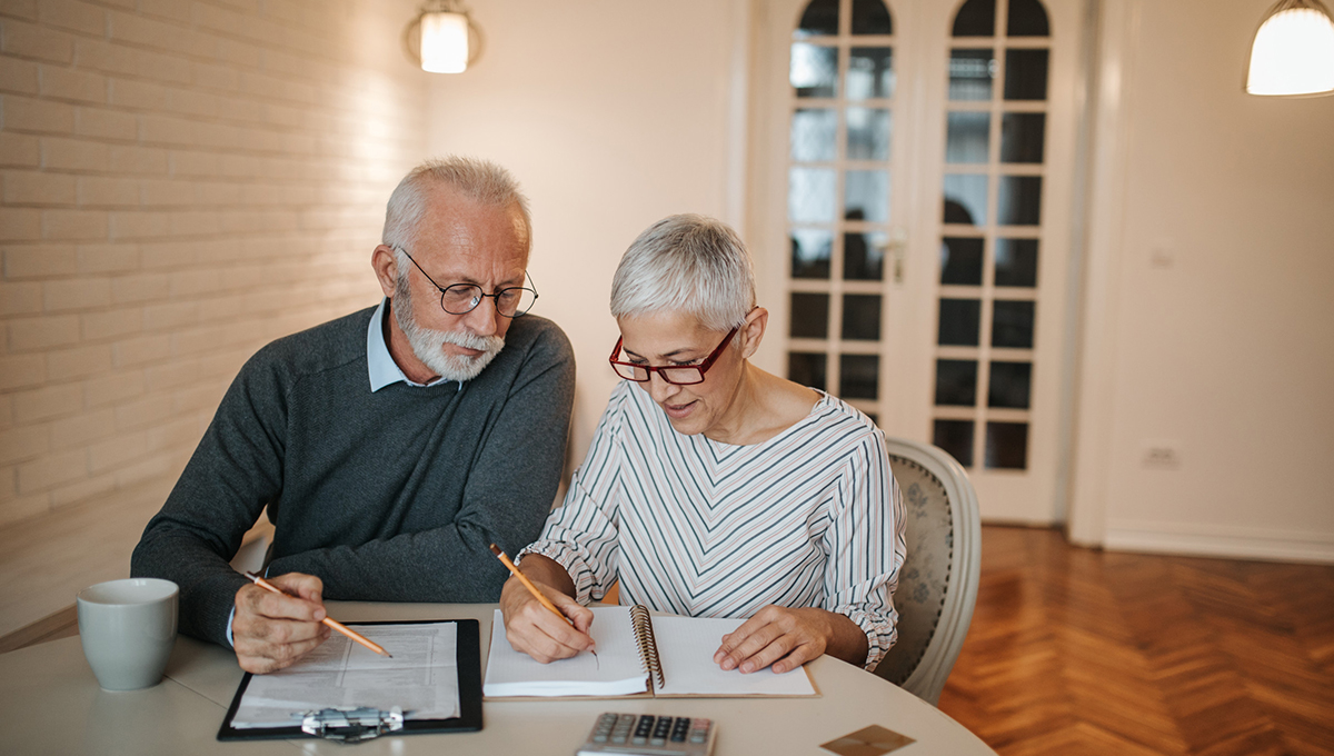 Couples writing down their Wills and Power of Attorney