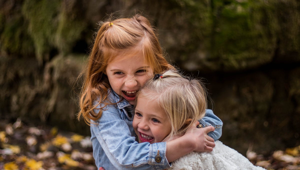 A picture showing happy sisters