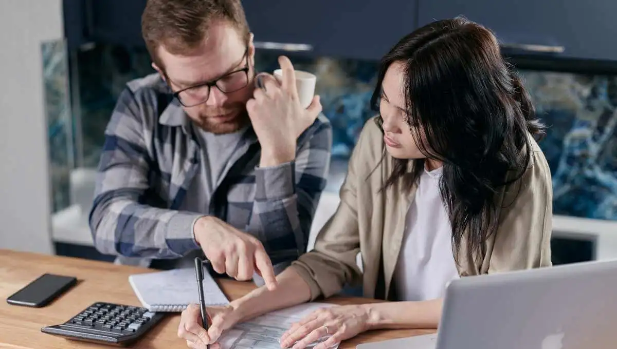 Image of a couple looking through documents