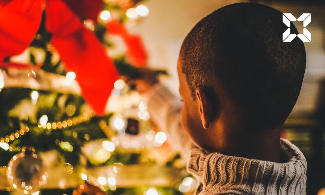 Little boy and a Christmas tree