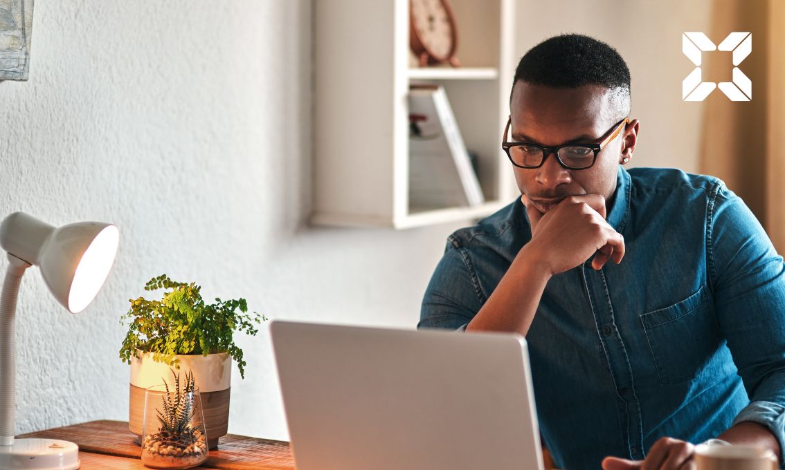 Man looking at his computer