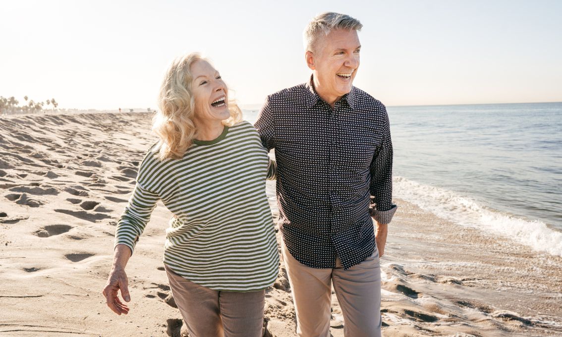 Happy couple by the beach side