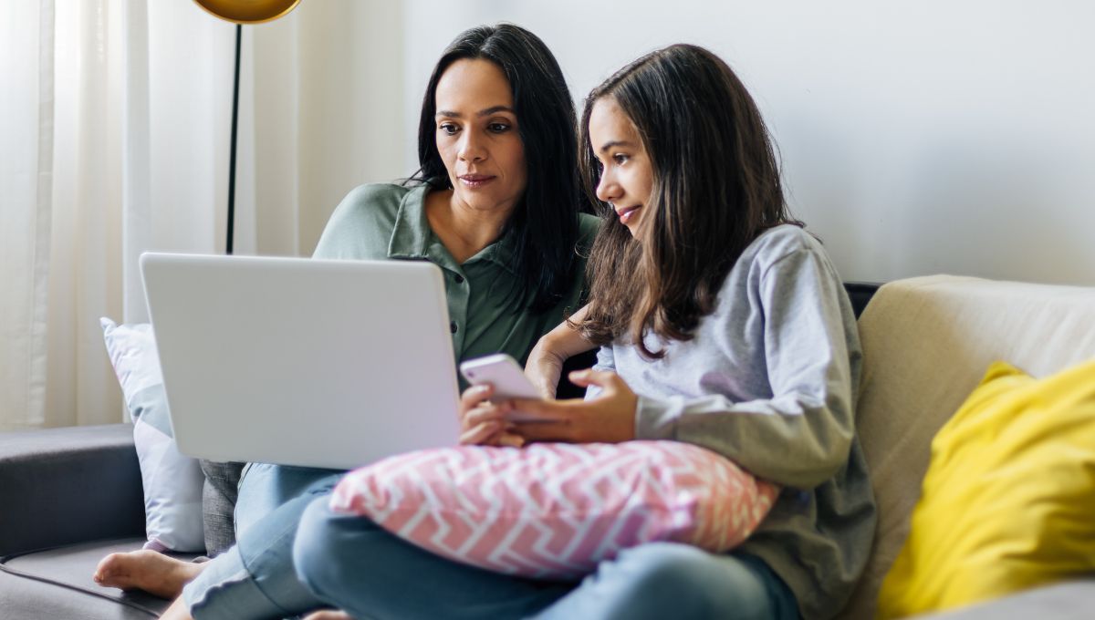 Mother and daughter engaging with their finances